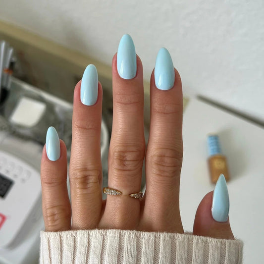 Sky blue pastel gel manicure painted with DIVA Lather Me Up on natural nails