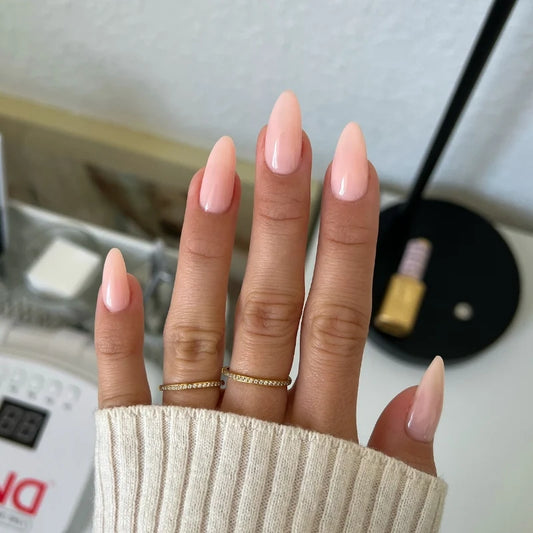 Light pink beige gel manicure painted with DND DIVA Painter's Antidote on natural nails