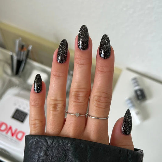 DND Night Sky #527 manicure featuring dramatic galactic black gel polish with sparkling glitter.