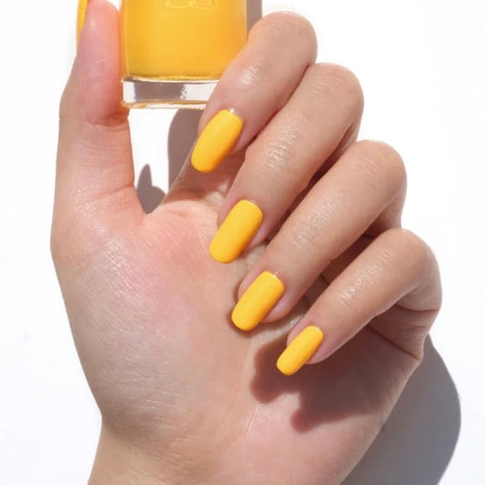 DND Summer Sun #506 manicure featuring a bold warm mustard yellow gel polish colour.