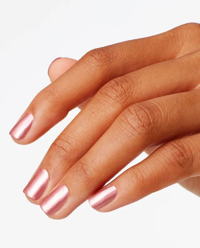 Close up of fingernails painted with OPI GelColor fine pink gel polish showing a glossy finish