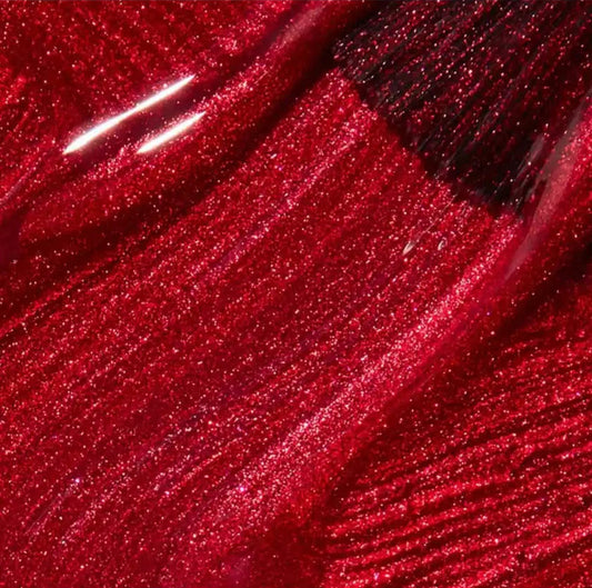 Red crĆØme nail polish swatch on tips showing OPI A Little Guilt Under The Kilt U12 rich pigmentation.