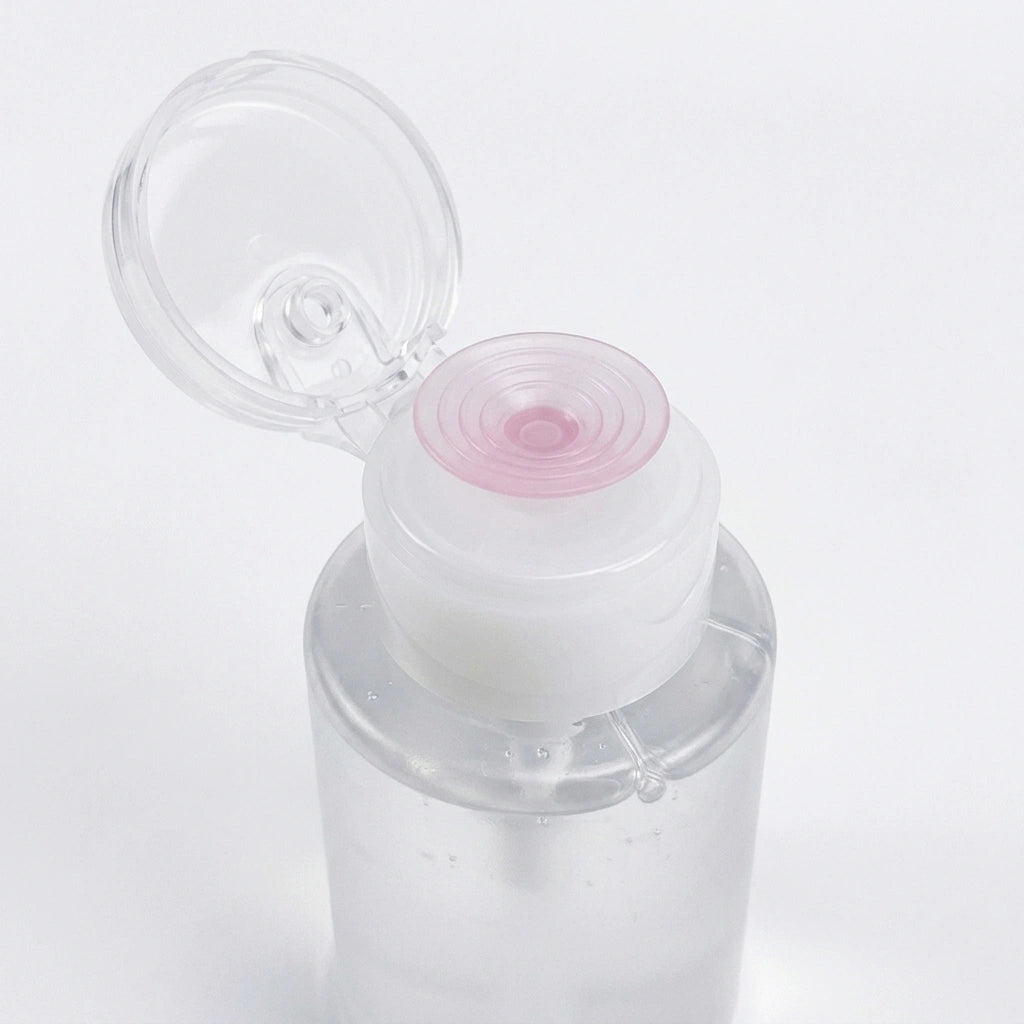 An angled view showcasing the spill-proof and leak-resistant features of the liquid dispenser bottle