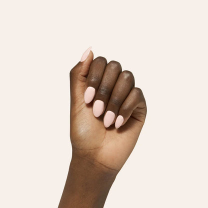 Hand with light pink nail polish on a beige background 04 Marshmellow | Bio Seaweed Gel - CM Nails & Beauty Supply