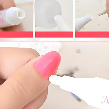 Close-up of a hand with pink nail polish being applied using a brush Nail Polish Corrector Remover Pen