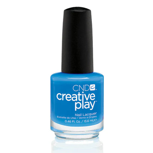 A bottle of CND Creative Play CND Creative Play Nail Polish - #493 Aquaslide nail lacquer in a bright medium blue shade, featuring a black cap and white text on the label, set against a plain white background with a soft reflection below.