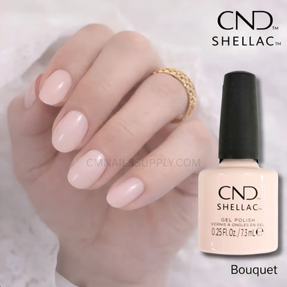 CND Shellac Bouquet gel nail polish shown in a bottle next to a hand with the polish applied, on a soft white background, for bridal wedding nails