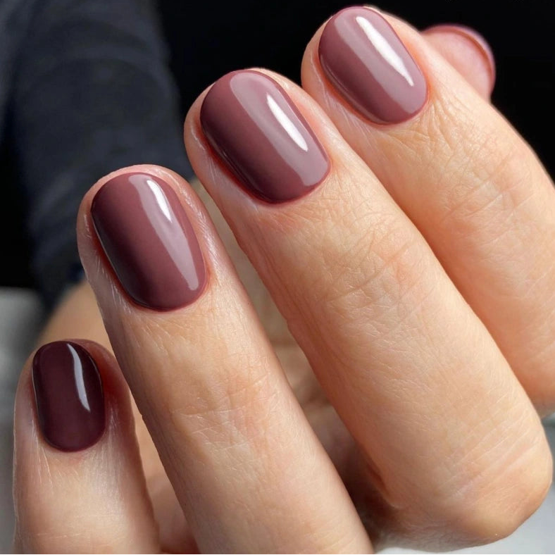 A close-up of a hand with manicured CND Shellac Arrowhead Gel Polish Manicure