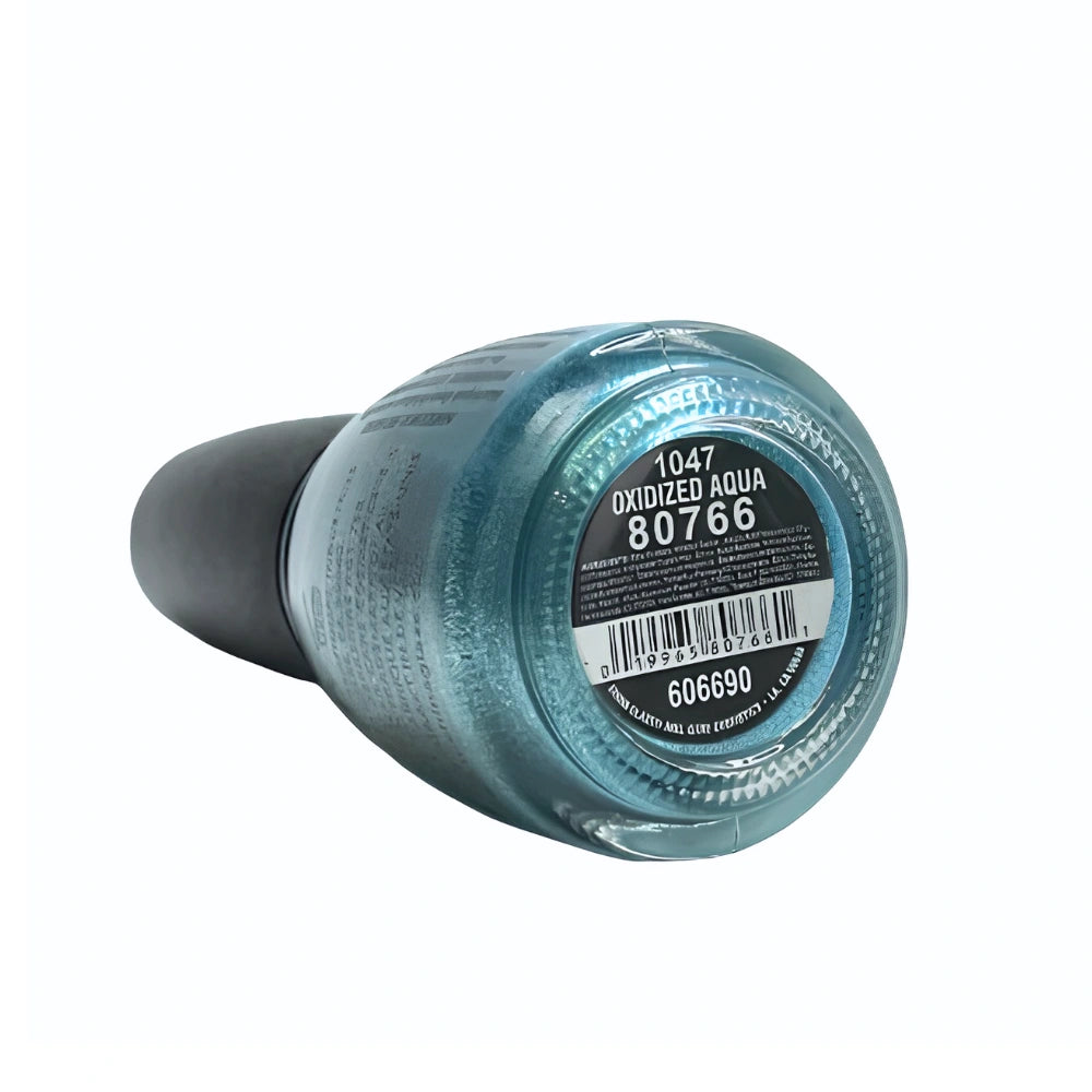 A bottle of nail polish shown from a side angle, displaying the bottom label with the shade name 'Oxidized Aqua 80766' and a metallic teal-blue nail polish color inside.