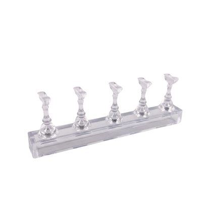 Clear nail stands on a white background