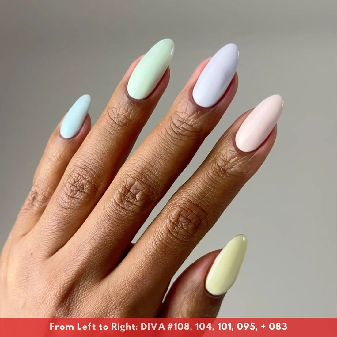 Fingers manicured in DIVA 018 sky blue pastel gel nail polish shade
