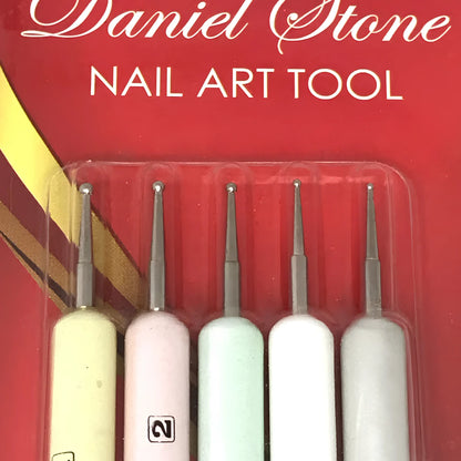 Five Daniel Stone nail art tools in a clear blister pack on a red retail card. The tools have pastel-colored handles in cream, pink, mint, white, and pale yellow, with silver metal tips.