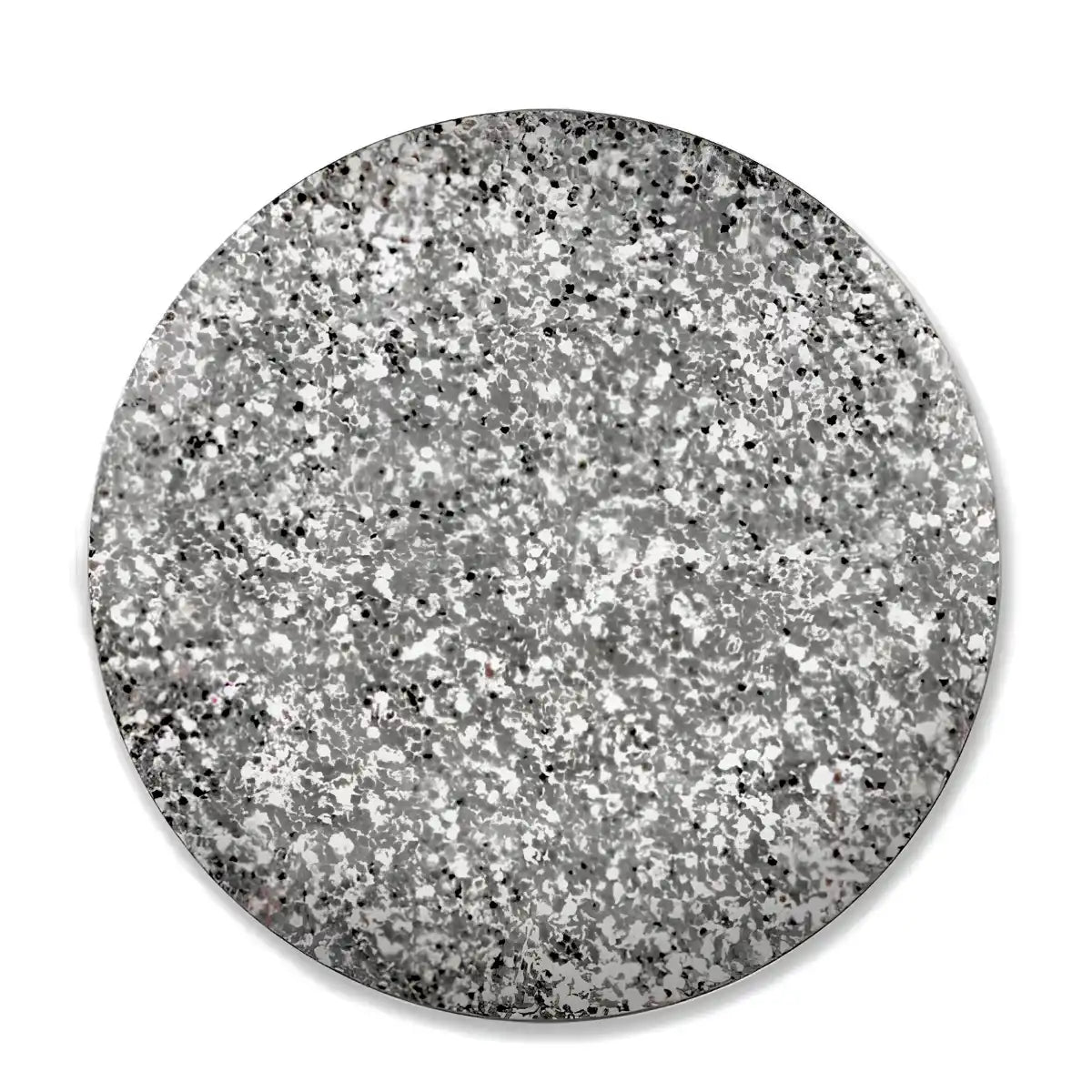 A circular swatch of silver glitter with black flecks, presented on a clean white background.