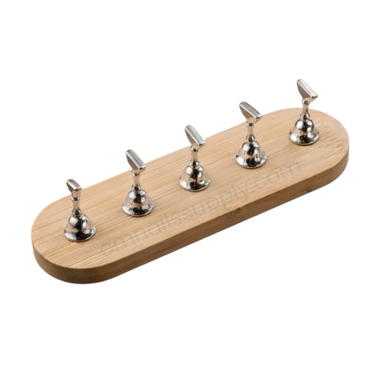 light wooden press on stands with silver stands