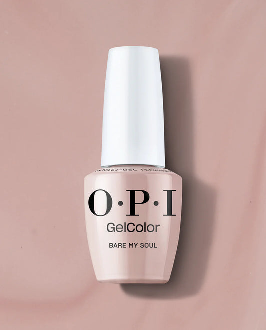 An OPI GelColor nail polish bottle in the shade 'Bare My Soul', featuring a pale pinkish-beige color and a white cap, set against a matching dusty pink background.