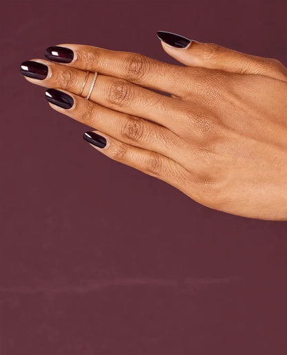 OPI Black Cherry Chutney Gel Polish moving hand manicure on purple swatch