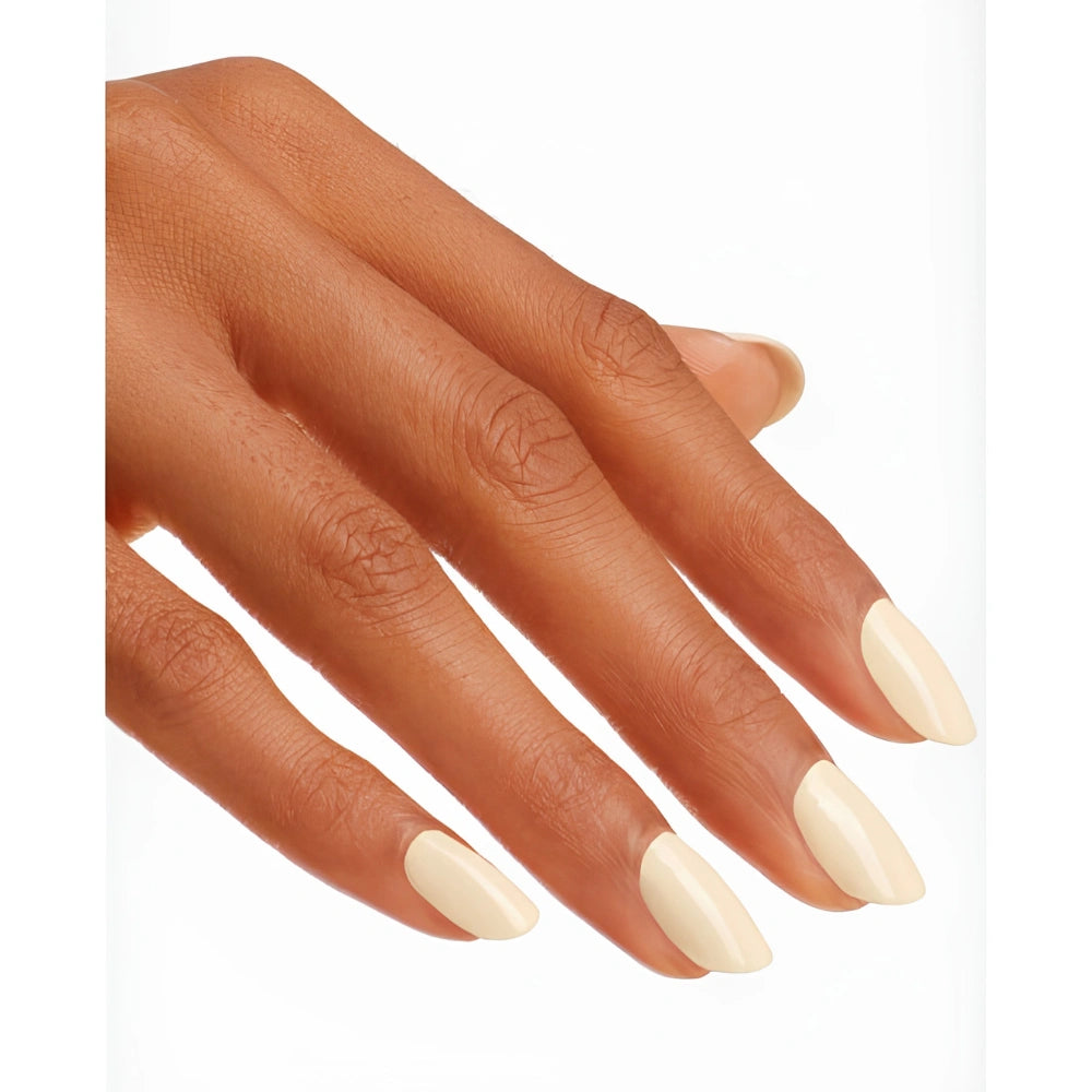 Hand with butter yellow OPI one chic chick nail polish on a white background