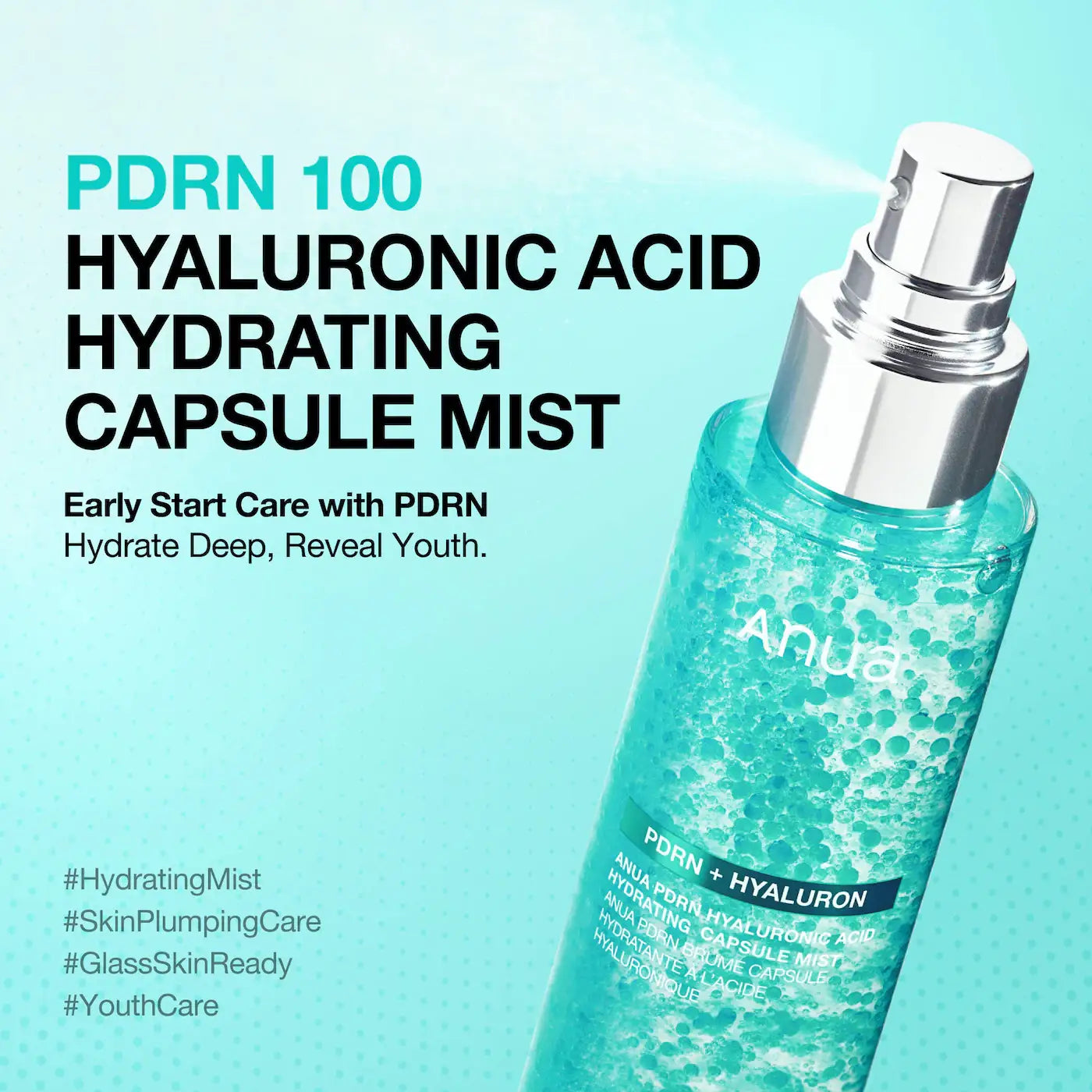 A bottle of AnuPore PDRN 100 Hyaluronic Acid Hydrating Capsule Mist shown at an angle, spraying a fine mist. The product is a translucent light blue-green liquid inside a clear bottle with a silver pump, set against a light blue background with promotional text.