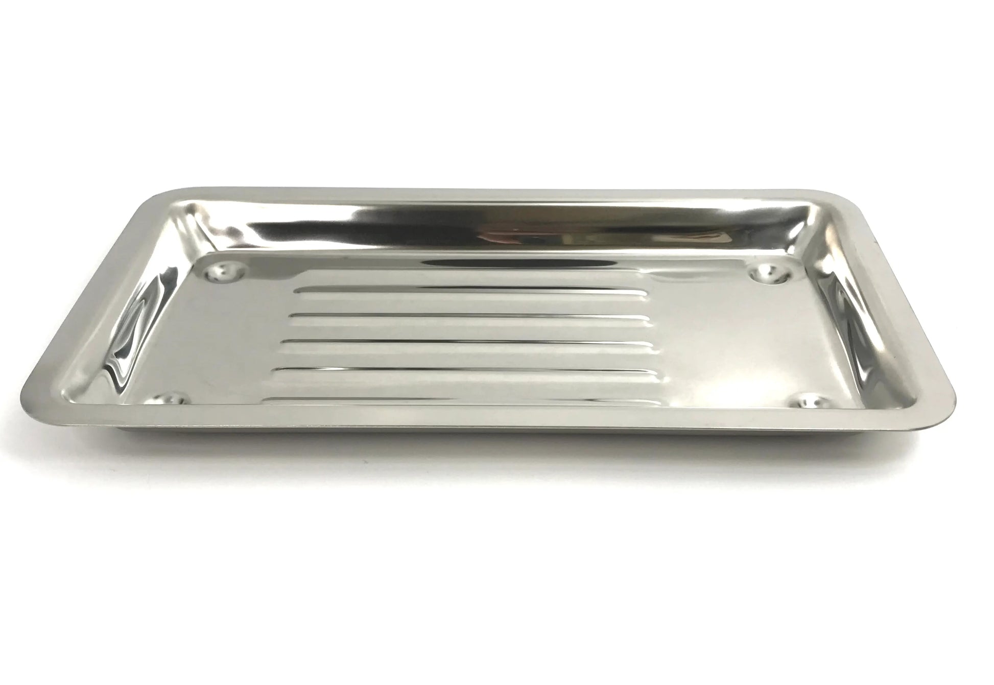 Close-up of the seamless, autoclavable 304 stainless steel construction of the tray