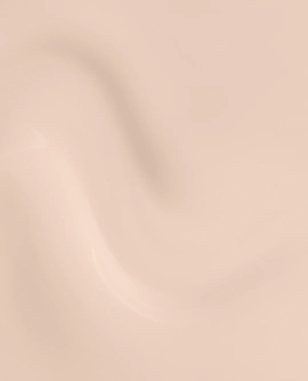 A close-up of a smooth, creamy beige OPI Berlin There, Doin’ That texture with soft wavy highlights.
