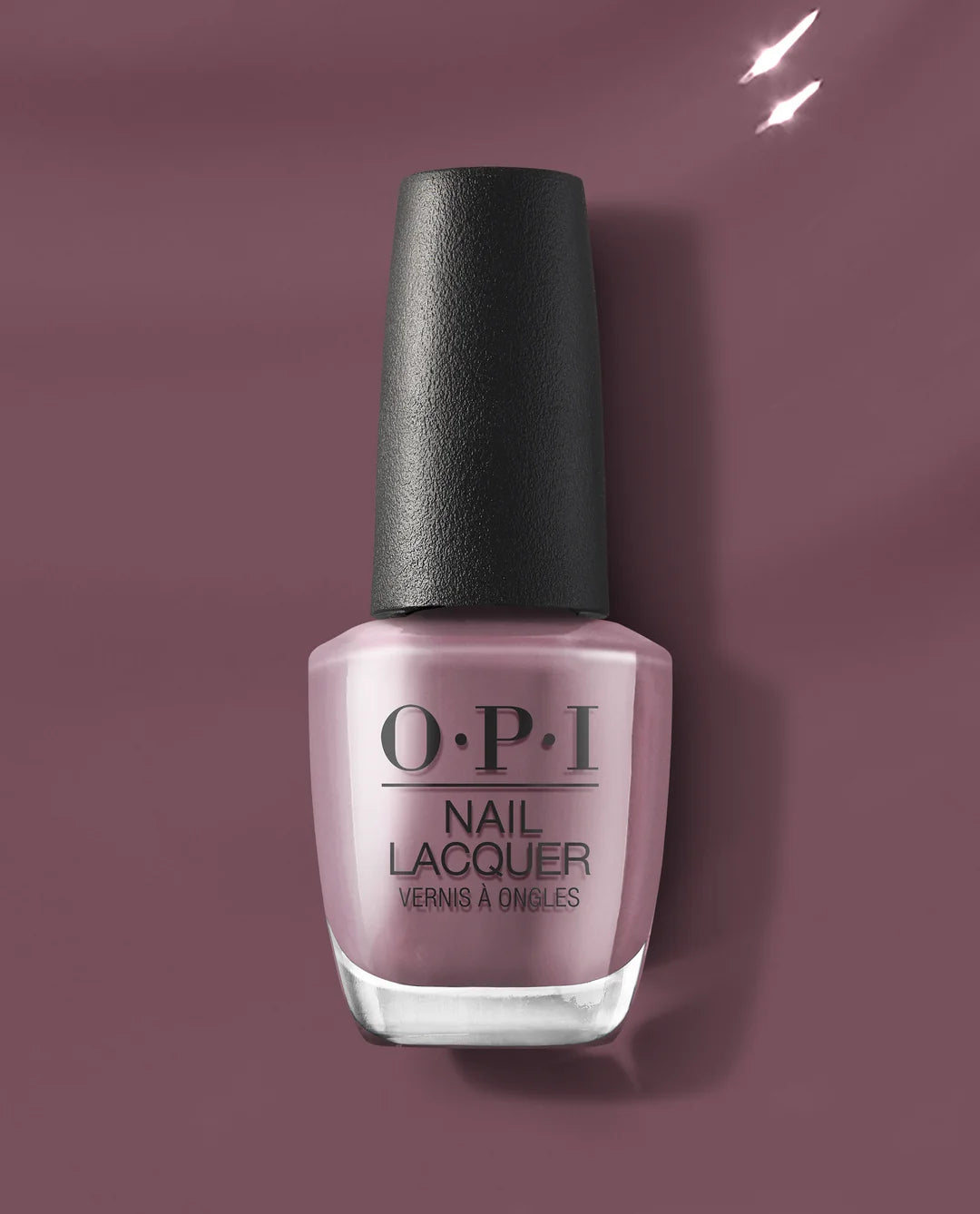 OPI claydreaming F002 nail polish bottle on a matching purple background
