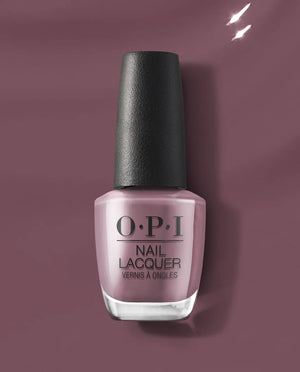 OPI claydreaming F002 nail polish bottle on a matching purple background