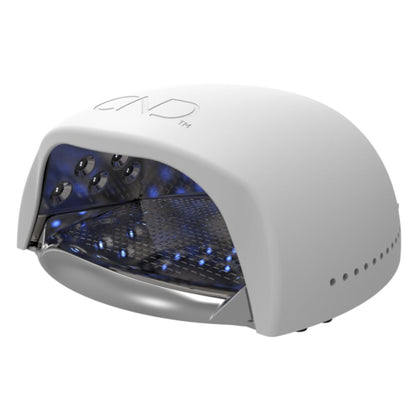 Professional nail salon setup featuring the genuine CND LED Lamp with removable tray