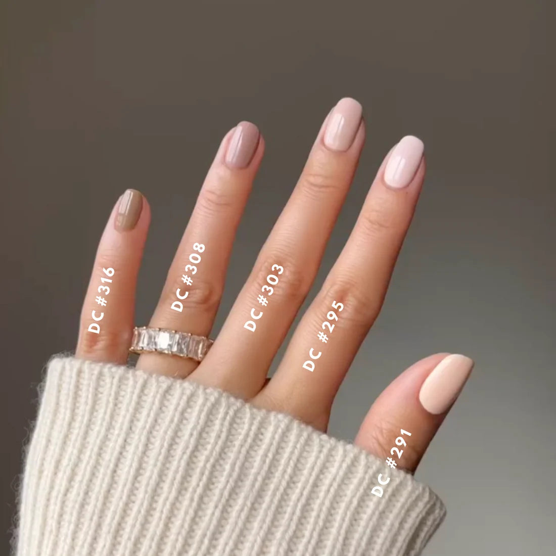 Creamy brown neutral creme gel polish, DND DC S’Mores #316, shown on a nail wheel