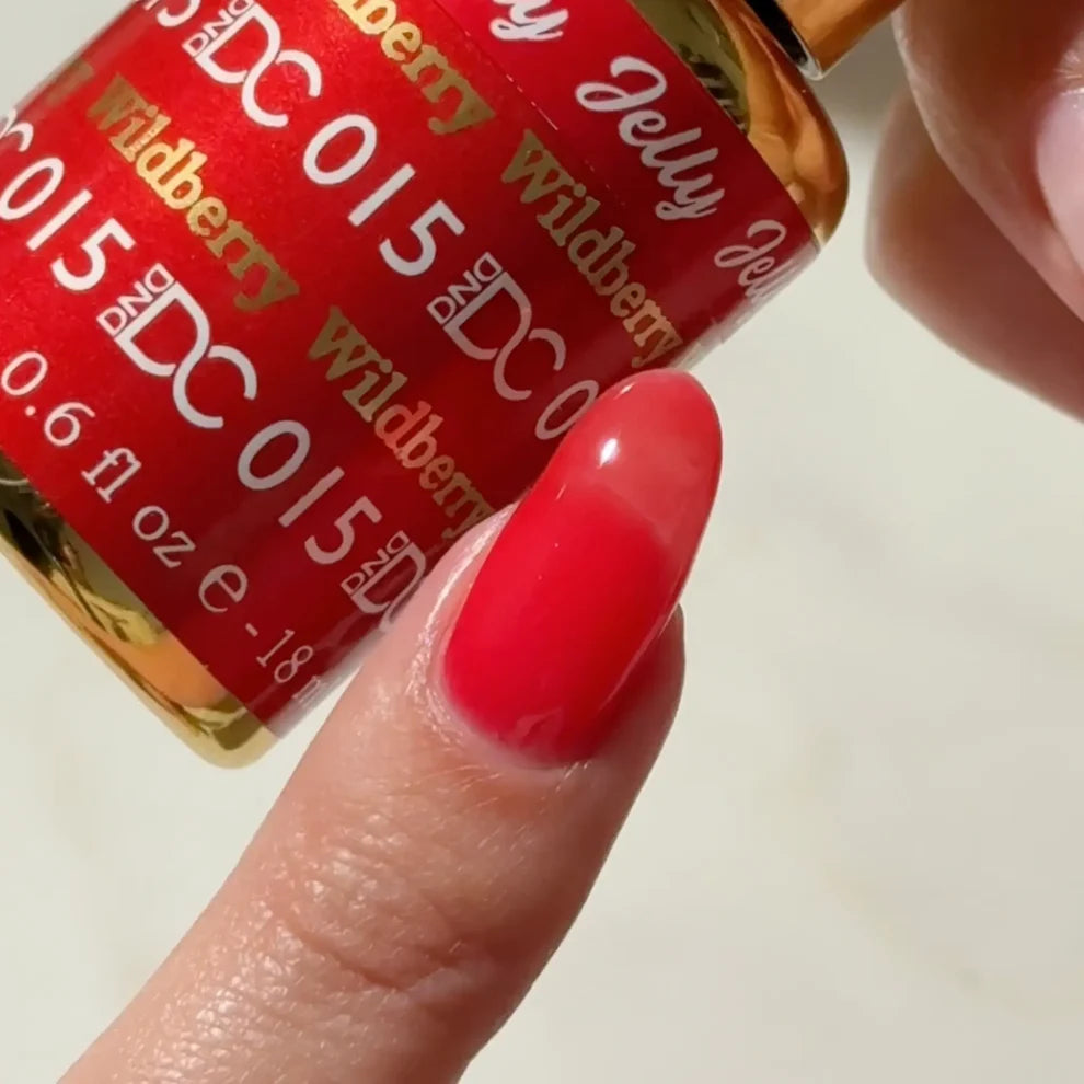 DC Jelly 015 Wildberry gel polish nail lacquer bottle showing the jelly gel polish formula in a strawberry red shade