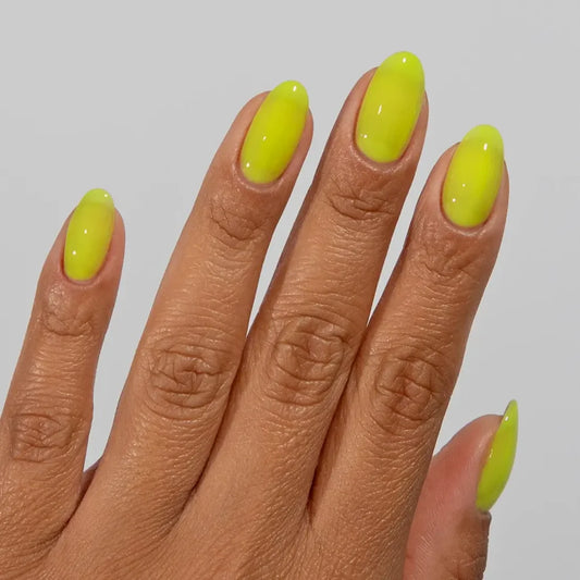 DC Jelly #02 Yellow manicure featuring a bright fluorescent yellow jelly nail polish finish.
