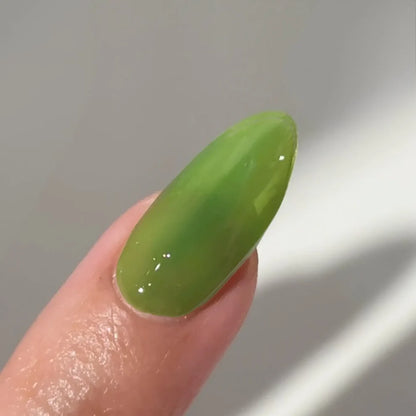 DC Jelly #04 Green jelly nail polish bottle in a vibrant apple green shade.