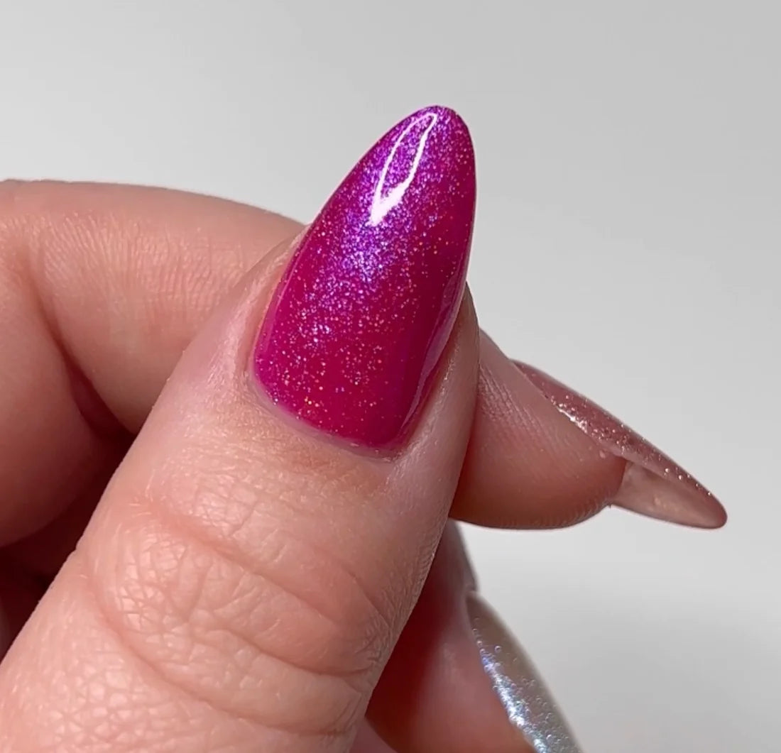 Magenta holographic nails created with DC Mermaid #245 Brizo gel nail polish