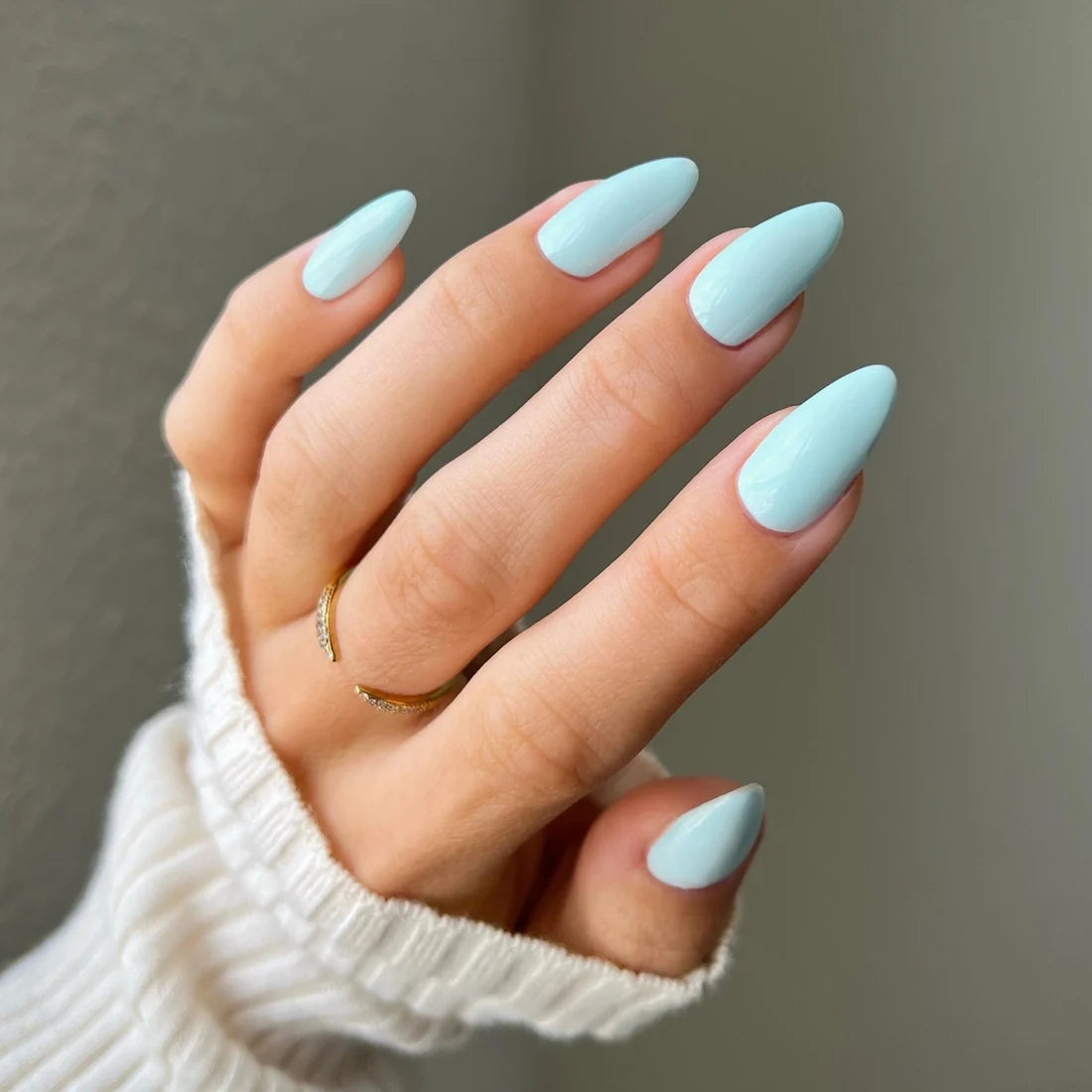 Close up manicure shot of DIVA 018 Lather Me Up pastel blue gel nail polish