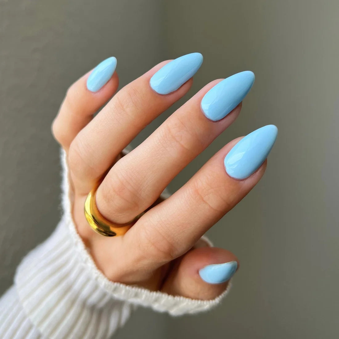 Bright blue gel nails manicure using DIVA 109 Sky High polish