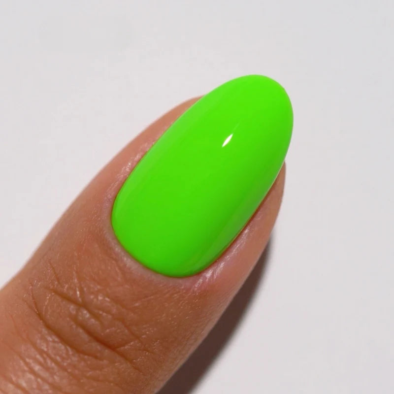 Lifestyle shot of manicured hands wearing DIVA #190 Tokyo Tea neon green gel polish in relaxed hand pose