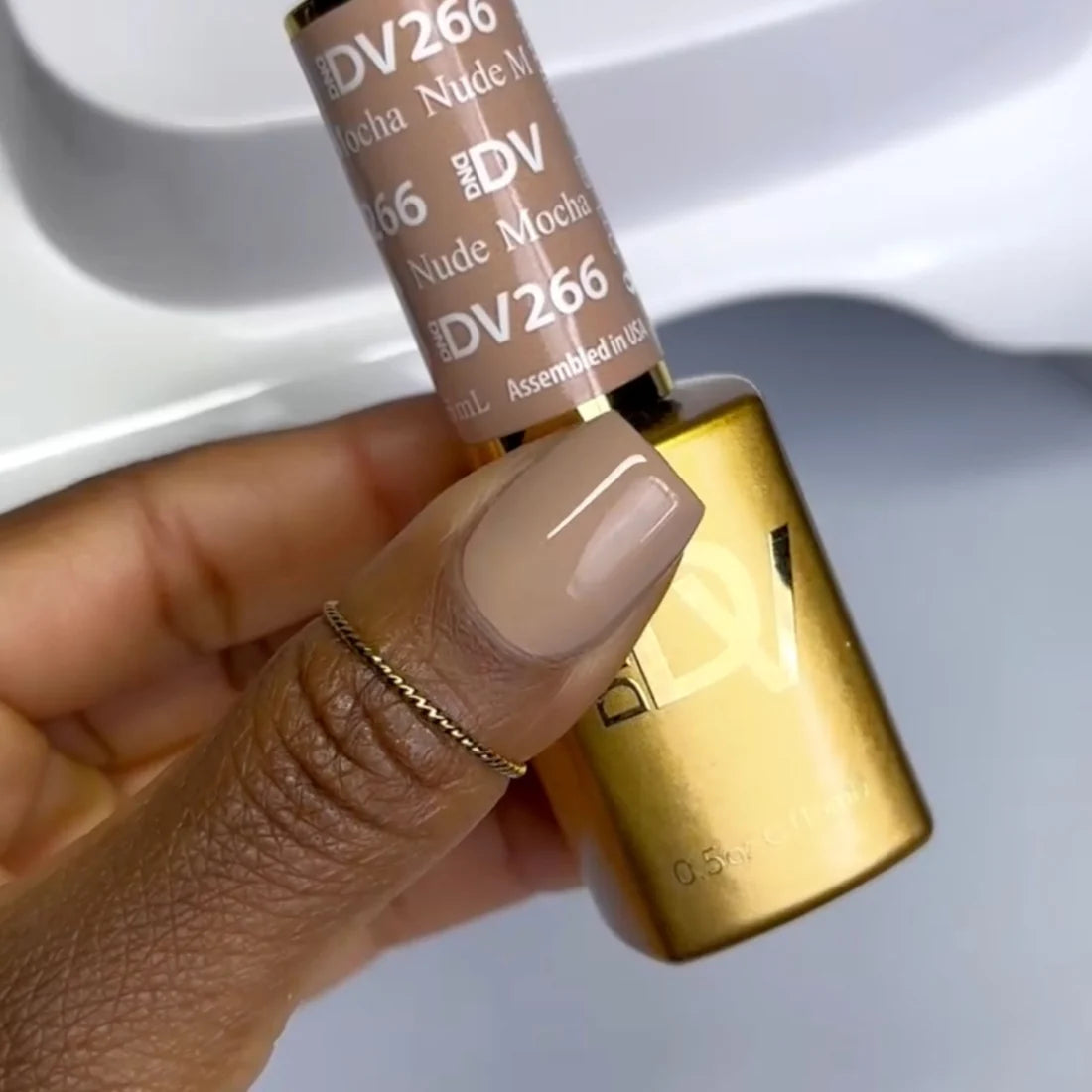 DIVA #266 Nude Mocha gel polish bottle in beige taupe
