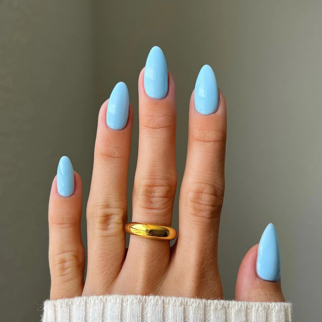 Bright sky blue gel manicure painted with DIVA Sky High on natural nails