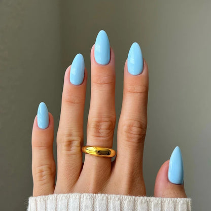 Bright sky blue gel manicure painted with DIVA Sky High on natural nails
