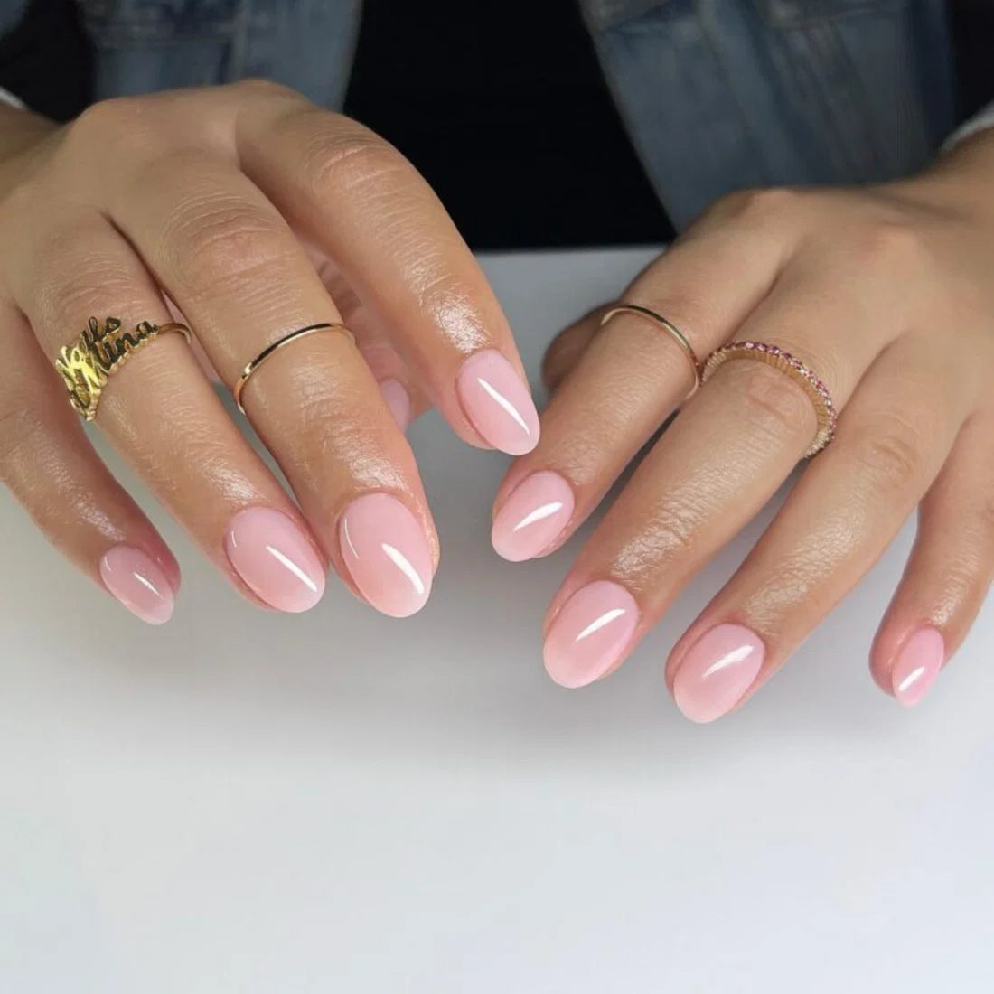 DND Pearly Pink #865 gel polish swatch showing a sheer pearly blush pink shade