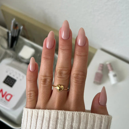 Full hand manicure in DND Bare Neutral 2345 sheer taupe polish for an everyday natural nail look