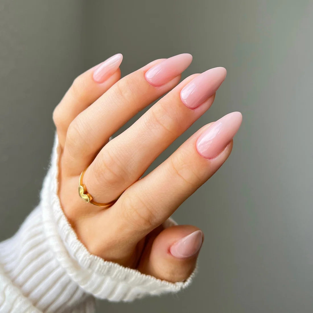 DND Bare Neutral 2345 sheer taupe polish shown on shaped nails highlighting the flush of the natural nail underneath