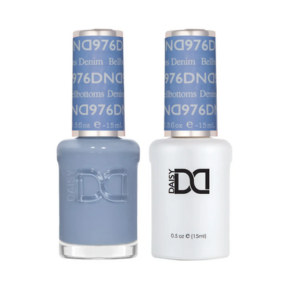 DND Bellbottoms 976 denim blue gel polish and matching lacquer bottles on white background.