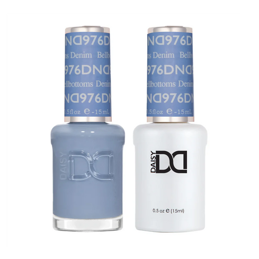 DND Bellbottoms 976 denim blue gel polish and matching lacquer bottles on white background.