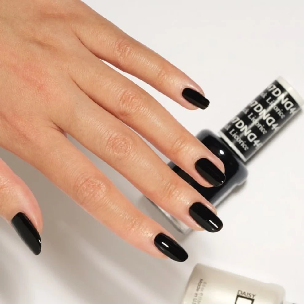 Black manicure featuring DND Black Licorice #447 with the matching Gel & Lacquer Duo.