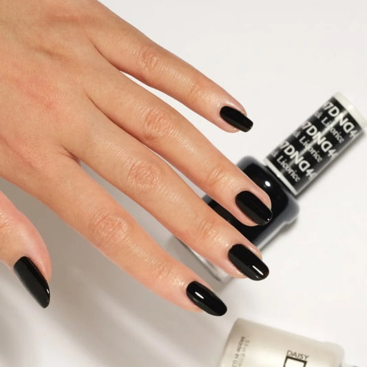 Black manicure featuring DND Black Licorice #447 with the matching Gel & Lacquer Duo.