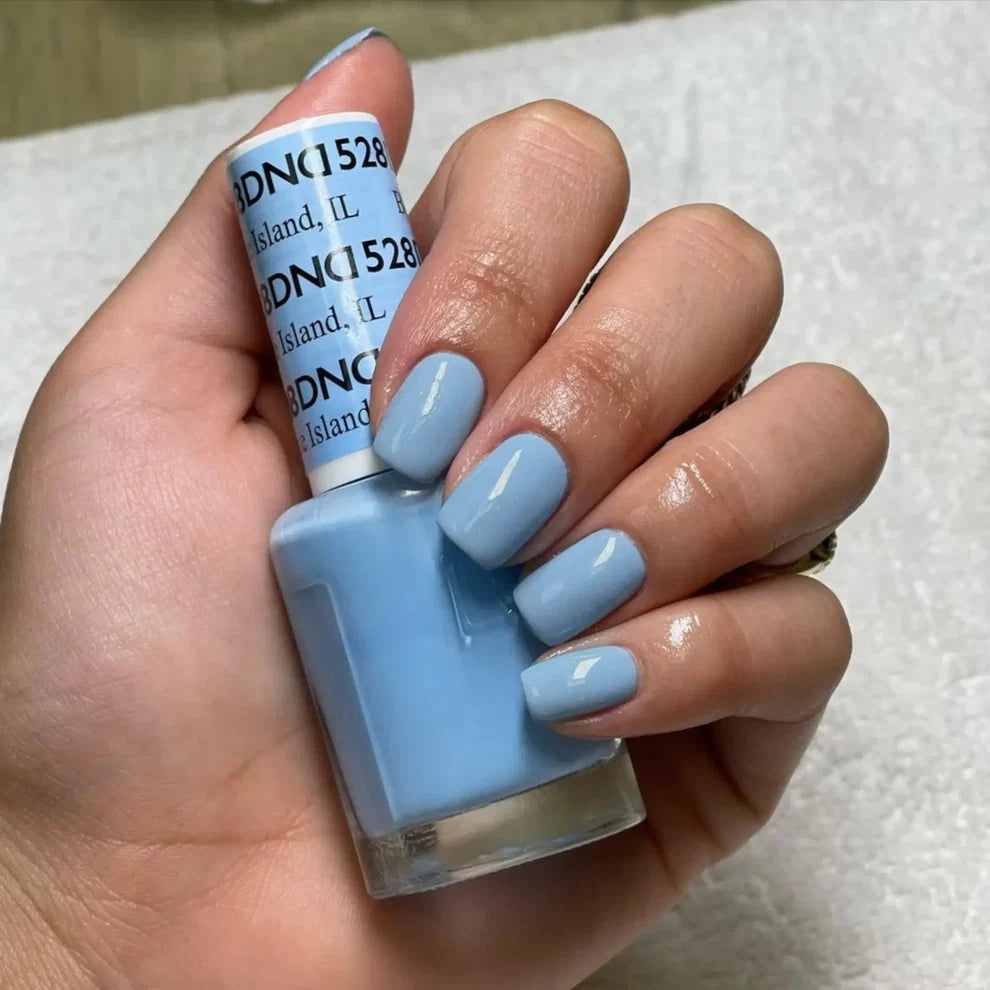 DND Blue Island #528 manicure featuring a soft chic baby blue gel polish finish.