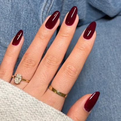 DND Cherry Mocha 751 duo set displayed on professional nail salon station with manicure tools.