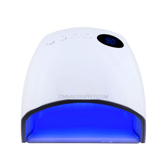 Studio photo of the white DND cordless LED UV nail lamp with strong UV light for fast gel polish curing