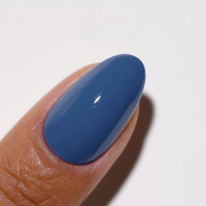 Close up swatch of DND DC Goodie Bag #321 showing the denim blue polish finish
