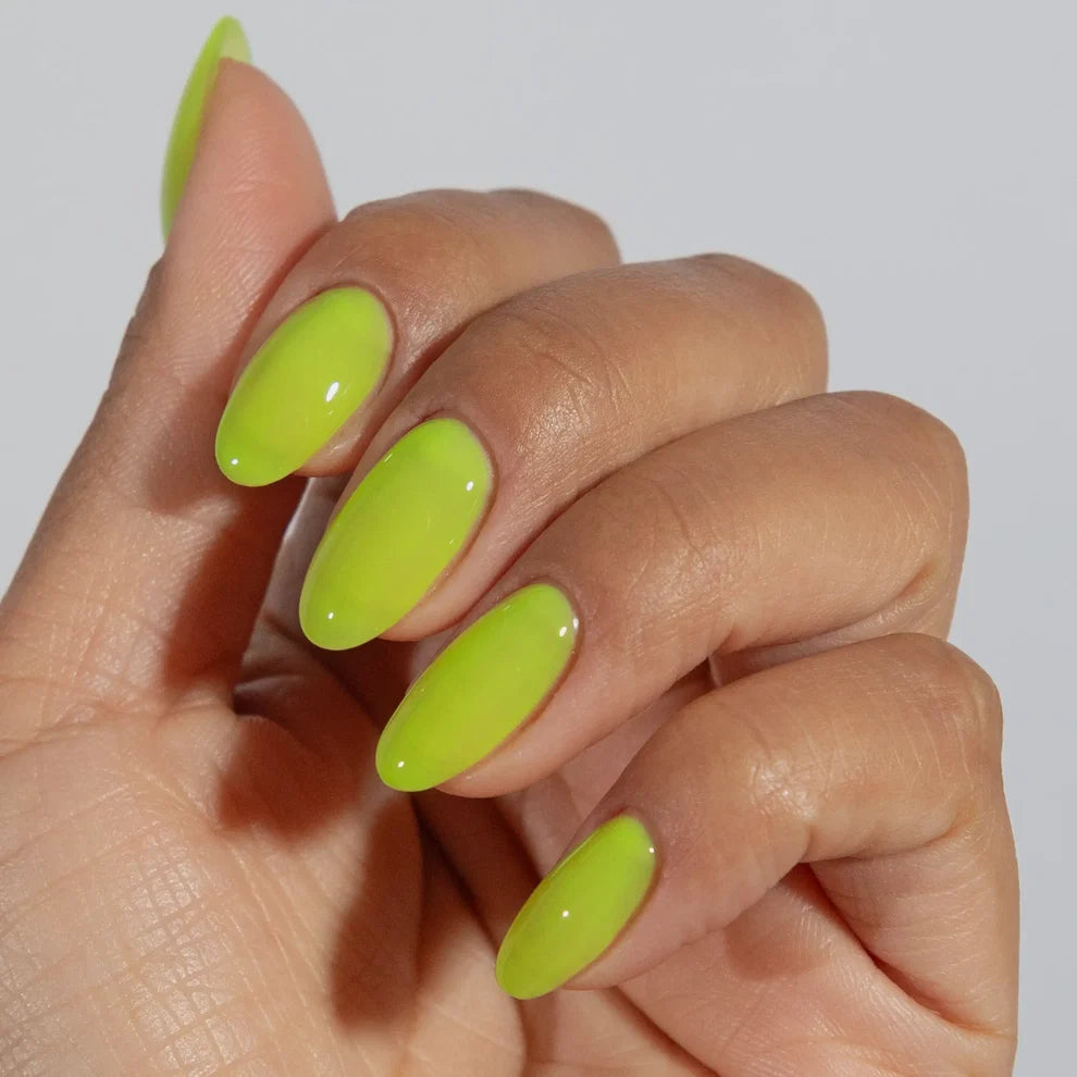 Hand swatch of 001 Tennis jelly gel polish showing the sheer finish over natural nails